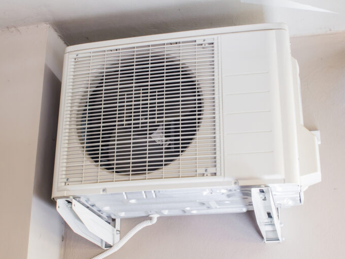 air compressor of an air conditioning system outside a building